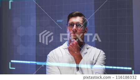 Caucasian male chef/restaurant staff wearing glasses is analyzing digital data 116186332
