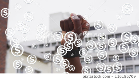 African American girlfriend/wife, wearing smartwatch, raising her fist African American girlfriend/wife, wearing smartwatch, raising her fist 116186709