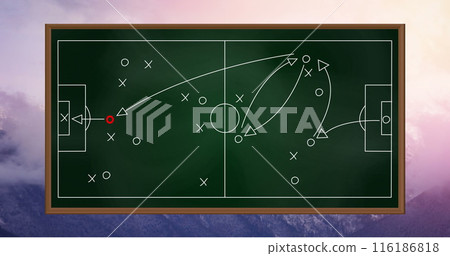 Coach explaining soccer tactics on black background, players listening attentively Coach explaining soccer tactics on black background, players listening attentively 116186818