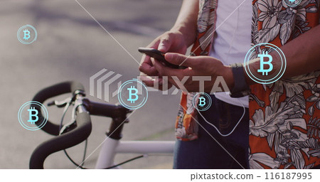 Image of bitcoin icons, data processing over african american man using smartphone 116187995