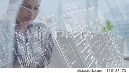 Image of financial data processing over caucasian businesswoman using laptop in office 116188470