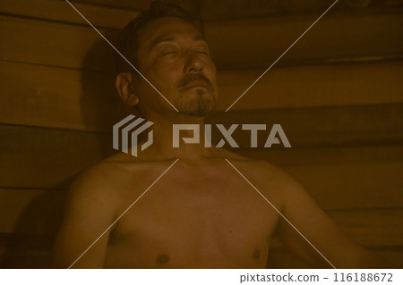 A man in his 50s enjoying the sauna 116188672