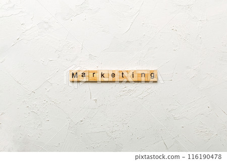Marketing word written on wood block. Marketing text on table, concept Marketing word written on wood block. Marketing text on table, concept 116190478
