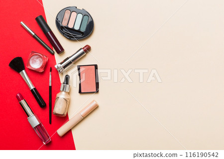 Professional makeup tools. Top view. Flat lay. Beauty, decorative cosmetics. Makeup brushes set and color eyeshadow palette on table background. Minimalistic style 116190542