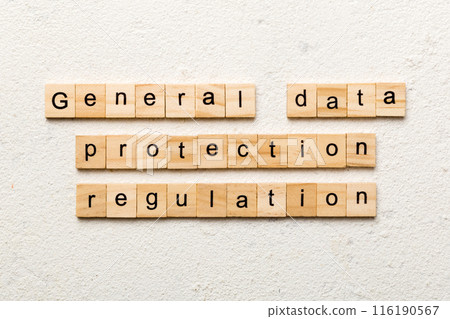 GDPR word written on wood block. General Data Protection Regulation text on cement table for your desing, concept GDPR word written on wood block. General Data Protection Regulation text on cement table for your desing, concept 116190567