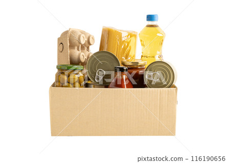 Foodstuff for donation isolated on white background with clipping path, storage and delivery. Various food, pasta, cooking oil and canned food in cardboard box. Foodstuff for donation isolated on white background with clipping path, storage and delivery. Various food, pasta, cooking oil and canned food in cardboard box. 116190656