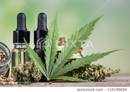 Hemp oil bottle with hemp leaf and cannabis leaf, marijuana 116190684