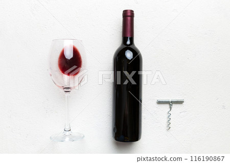 Flat lay composition with corkscrew, bottle of wine and elegant glass on colored table. Flat lay, top view wth copy space 116190867