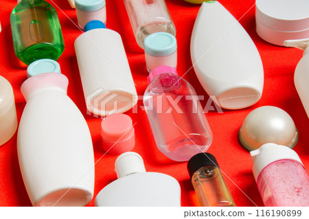 Group of plastic bodycare bottle Flat lay composition with cosmetic products on colored background empty space for you design. Set of White Cosmetic containers, top view with copy space Group of plastic bodycare bottle Flat lay composition with cosmetic products on colored background empty space for you design. Set of White Cosmetic containers, top view with copy space 116190899