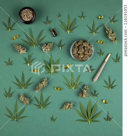 Top view of marijuana leaves and cannabis buds, cbd concept 116191055