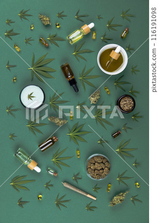 Top view of marijuana leaves and cannabis buds, cbd concept 116191098