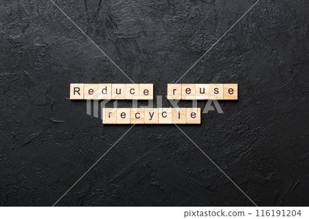 reduce, reuse and recycle word written on wood block. reduce, reuse and recycle text on cement table for your desing, concept reduce, reuse and recycle word written on wood block. reduce, reuse and recycle text on cement table for your desing, concept 116191204