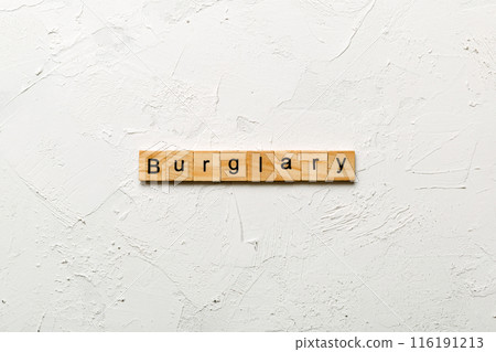 burglary word written on wood block. burglary text on table, concept burglary word written on wood block. burglary text on table, concept 116191213