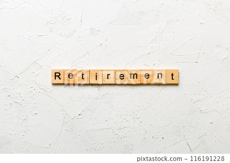 retirement word written on wood block. retirement text on cement table for your desing, concept retirement word written on wood block. retirement text on cement table for your desing, concept 116191228