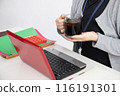 A woman with beautiful hands working 116191301