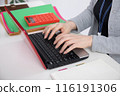 A woman with beautiful hands working 116191306