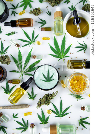 Bottles with hemp oil and cannabis leaves, marijuana on white background Bottles with hemp oil and cannabis leaves, marijuana on white background 116191645