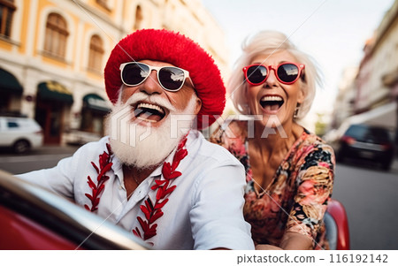 Senior couple travel and have fun together, drive a convertible car 116192142