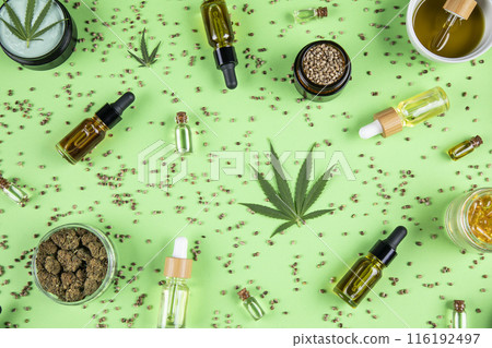 Marijuana buds with cannabis leaves on cbd concept 116192497
