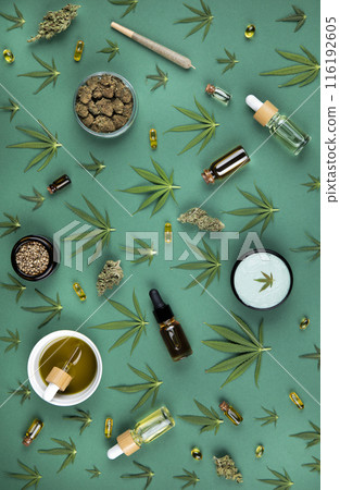 Flat lay, Top view of marijuana leaves and cannabis buds, cbd concept Flat lay, Top view of marijuana leaves and cannabis buds, cbd concept 116192605