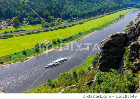 Panoramic scenic view vintage steam paddle boat cruising Elbe river curve at Sachsische Schweiz National Park Germany from Bastei Sandstone mountain valley. Europe travel nature landscape destination 116193549