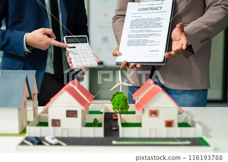 Businessman team brainstorming using tablet, laptop computer for working technology and business,  Renewable energy-based green businesses and global warming. Reduce CO2 emission. 116193788