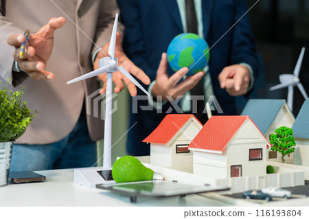 Businessman team brainstorming using tablet, laptop computer for working technology and business,  Renewable energy-based green businesses and global warming. Reduce CO2 emission. 116193804