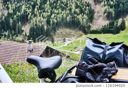 Biker's viewpoint overlooking mountain landscape Biker's viewpoint overlooking mountain landscape 116194020