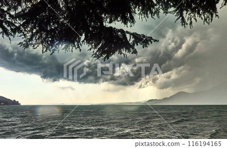 Approaching Thunderstorm Clouds Over Lake Garda in Italy Approaching Thunderstorm Clouds Over Lake Garda in Italy 116194165