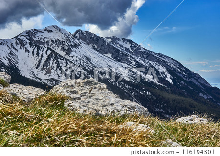 Snow-Covered Peaks of Monte Baldo with Rising Clouds in the Background Snow-Covered Peaks of Monte Baldo with Rising Clouds in the Background 116194301