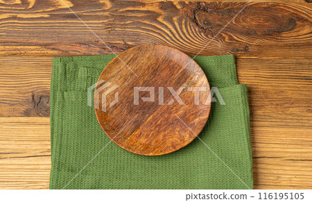 Empty Plate on Wooden Table Top View with Copy Space for Text, Rustical Kitchen Mock Up Empty Plate on Wooden Table Top View with Copy Space for Text, Rustical Kitchen Mock Up 116195105