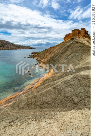 Ghajn Tuffieha Bay and Qarraba Bay with red sand. Malta 116195927