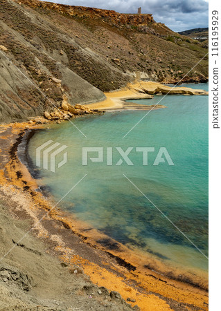 Ghajn Tuffieha Bay and Qarraba Bay with red sand. Malta 116195929