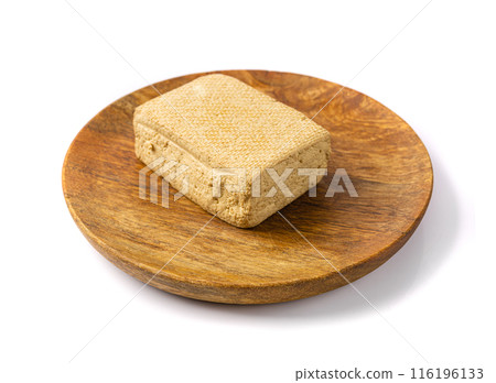 Tofu Cheese Isolated, Smoked Vegan Cheese Slice, Sliced Soya Bean Curd, Soy Protein or TSP Tofu Cheese Isolated, Smoked Vegan Cheese Slice, Sliced Soya Bean Curd, Soy Protein or TSP 116196133