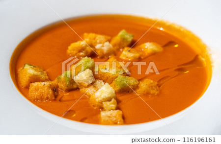 Creamy tomato soup or bisque with croutons, delicious rich smooth texture, perfect healthy lunch Creamy tomato soup or bisque with croutons, delicious rich smooth texture, perfect healthy lunch 116196161