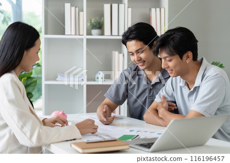 LGBTQIA gay couple consulting with financial advisor in modern office. Concept of financial planning and teamwork LGBTQIA gay couple consulting with financial advisor in modern office. Concept of financial planning and teamwork 116196457