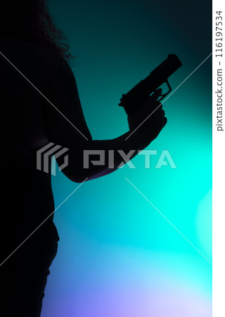 Lady holding pistol gun Lady holding pistol gun 116197534