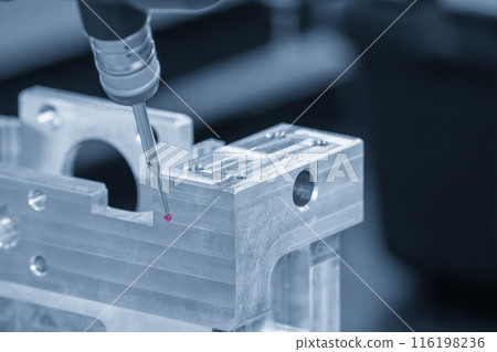 Closeup scene the multi-axis CMM machine measuring the aluminum automotive parts. 116198236