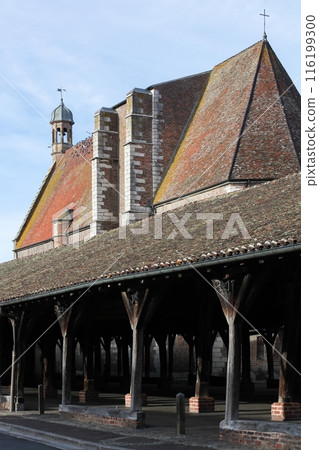 View of the medieval market hall and the church in Chatillon-sur-Chalaronne, France 116199300