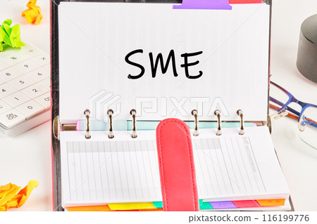 SME, small and medium enterprise. SME in an open notebook on a white background SME, small and medium enterprise. SME in an open notebook on a white background 116199776