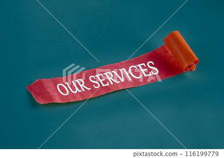Business concept. OUR SERVICES on a piece of an unfolded note 116199779