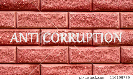 Anti money laundering business and government concept. ANTI CORRUPTION on a red decorative brick 116199789