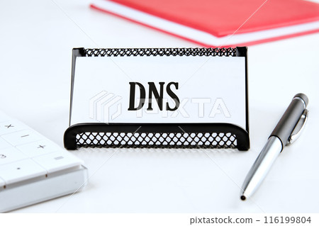 DNS Domain Name Server. Business and DNS concept. Copy space. DNS written on a business card on a white background 116199804