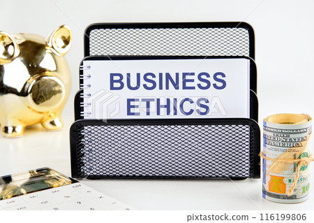 Business ethics and compliance concept. BUSINESS ETHICS in a notebook on a stand 116199806