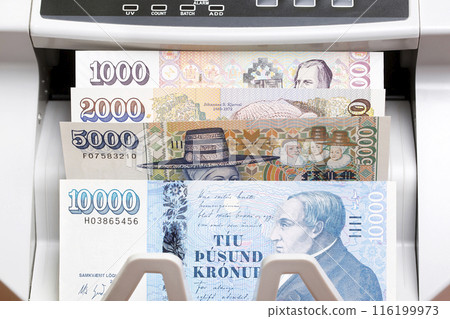 Icelandic crown in the counting machine Icelandic crown in the counting machine 116199973