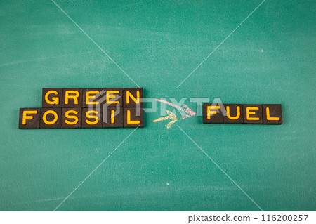 Green and Fossil Fuel Concept. Old letter tiles on a green chalkboard background 116200257