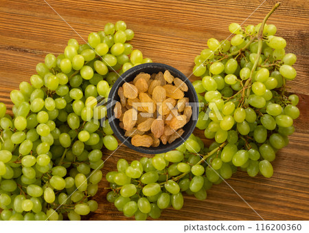 Heap of Yellow Sultanas Raisins on White Background 116200360