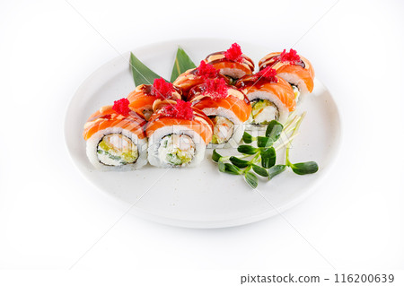 Sushi roll with salmon and tempura shrimp drizzled with unagi sauce and tobiko caviar 116200639