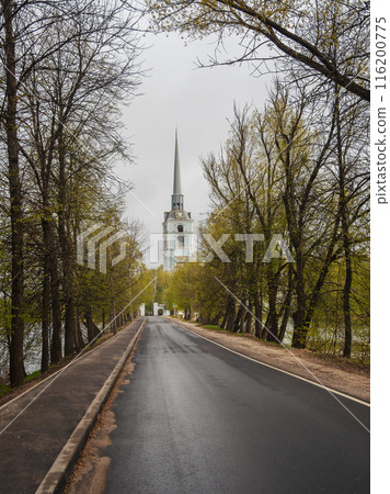 Paved road to the distant church. 116200775