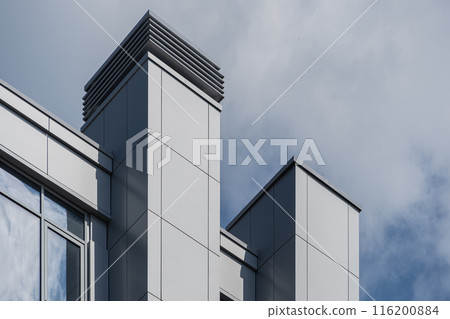Facade of a modern residential building, building texture 116200884